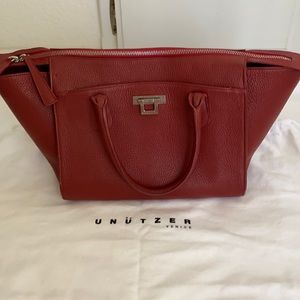 Unutzer pebbled brick red leather handbag